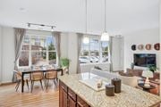 Highlands Ranch apartment for rent - A kitchen with a table and chairs in front of a window.