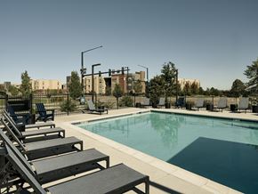 Englewood apartment for rent - The pool amenity with plenty of seating at Apex Meridian South Apartments in Englewood.