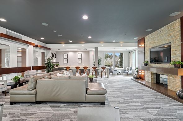 San Jose apartment for rent - The resident lounge amenity with plenty of seating for co-work and socialization space at Elan at River Oaks in San Jose.