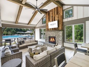 Access to expansive clubhouse with fitness center, gathering space with floor-to-ceiling fireplaces, and oversized indoor games