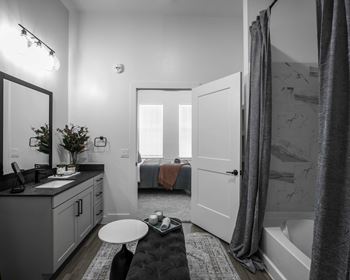 Designer bathrooms with granite countertops and dual vanities*
