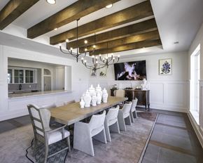 Aledo apartment for rent - a dining room with a long wooden table and white chairs