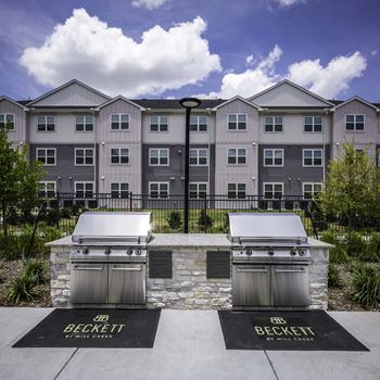 Outdoor kitchen with grilling areas