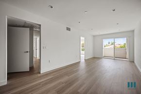 Los Angeles apartment for rent - an empty living room with white walls and wooden floors