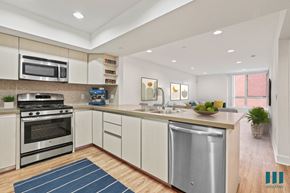 Los Angeles apartment for rent - Open-concept kitchen, with Stainless-Steel Refrigerator, Stove, Microwave Oven, Dishwasher, and Countertop Bar