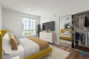 Los Angeles apartment for rent - Bedroom with Mirrored Closet, Vinyl Flooring, Recessed Lighting, and Large-Size Windows