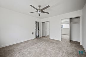 Los Angeles apartment for rent - Bedroom with Two-Mirrored Closets, Ceiling Fan, and Carpet