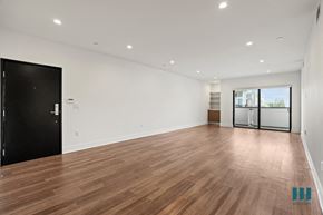 Los Angeles apartment for rent - Front Entrance, Living Room with Built-In Cabinet, Shelving, Vinyl Flooring, Recessed Lighting, and Patio