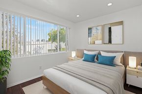 Los Angeles apartment for rent - Bedroom with Vinyl Flooring, Recessed Lighting, and Large Window