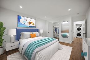 Los Angeles apartment for rent - a bedroom with a blue and white bed and a mirror