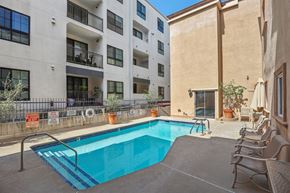 Los Angeles apartment for rent - our apartments have a swimming pool and a patio with chairs