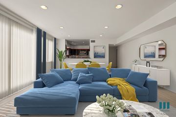 Los Angeles apartment for rent - a living room with a blue couch and a yellow blanket