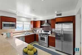 Los Angeles apartment for rent - Large-Size Kitchen with Stainless-Steel Refrigerator, Stove, Microwave Oven, and Dishwasher