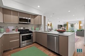 Los Angeles apartment for rent - Open-Concept Kitchen with Stainless-Steel Appliances and a Countertop Bar