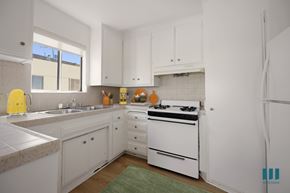 Los Angeles apartment for rent - Kitchen with Stove, Refrigerator, and Ample Cabinet Storage