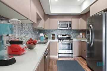 Los Angeles apartment for rent - a kitchen with stainless steel appliances and a counter top with a blender