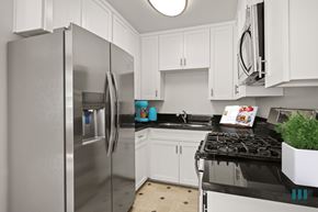 Los Angeles apartment for rent - Kitchen with Stainless-Steel Refrigerator, Stove, and Microwave Oven