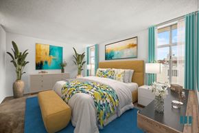 Los Angeles apartment for rent - A bedroom with a large bed and a painting on the wall.