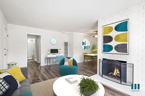 Los Angeles apartment for rent - A living room with a fireplace and a couch.