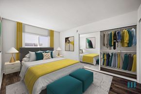 Los Angeles apartment for rent - A bedroom with a bed, a bench, and a wardrobe with clothes.