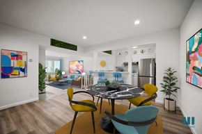 Los Angeles apartment for rent - A modern dining room with a round table and chairs.