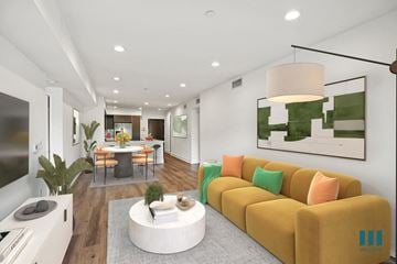 Los Angeles apartment for rent - A modern living room with a yellow sofa and a white coffee table.