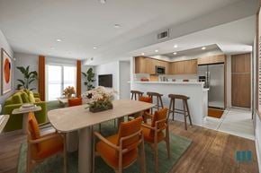 Los Angeles apartment for rent - Open-Concept Kitchen with Countertop Bar, Dining, and Living Room with a Patio