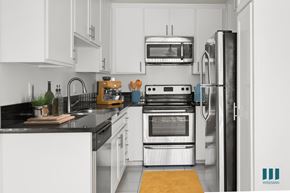 Los Angeles apartment for rent - Kitchen with Stainless-Steel Dishwasher, Stove, Microwave Oven, and Refrigerator and Ample Cabinet Storage