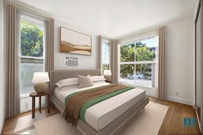 Los Angeles apartment for rent - Bedroom with Multiple Windows, Vinyl Flooring, and a Mirrored Closet