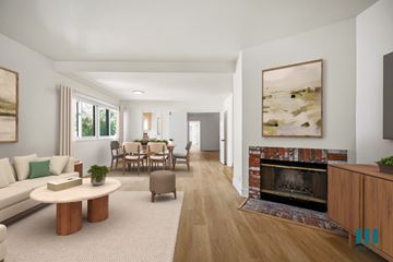 Los Angeles apartment for rent - A living room with a fireplace and a painting on the wall.