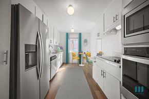 Los Angeles apartment for rent - A modern kitchen with stainless steel appliances and white cabinets.