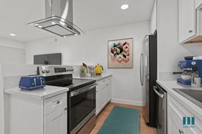 Los Angeles apartment for rent - Open-Concept Kitchen with Stainless -Steel Refrigerator, Dishwasher, Stove, and Microwave