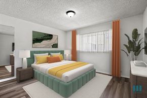 Los Angeles apartment for rent - A bedroom with a large bed and a painting on the wall.