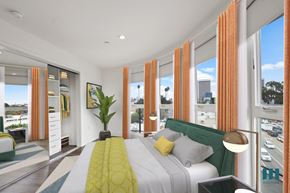 Los Angeles apartment for rent - Modern Bedroom with Lots of Windows Providing Natural Light and a Mirrored Closet with Built-In Organizers