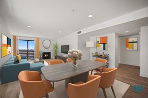 Los Angeles apartment for rent - Open-Concept Dining and Living Room with Vinyl Flooring, Recessed Lighting, Electric Fireplace, and Patio