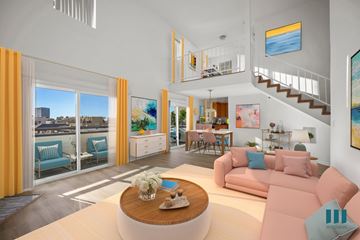 Los Angeles apartment for rent - A living room with a pink couch and a wooden coffee table.