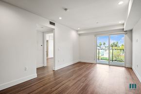 Los Angeles apartment for rent - Living Room Area with Vinyl Flooring, Recessed Lighting, and a Patio