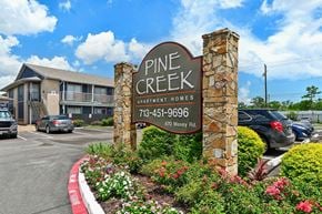 Houston apartment for rent - sign for Pine Creek Apartment at Pine Creek Apartments, Texas