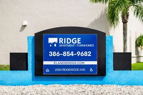 South Daytona apartment for rent - the monument sign in front of Ridge Apartments in South Daytona, FL