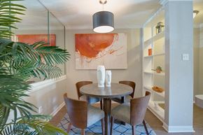 Houston apartment for rent - a dining room with built-in shelving and model furnishings in a home at Hudson at Westchase Apartments