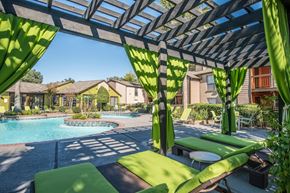 Houston apartment for rent - a resort-style cabana around a lagoon-inspired pool at Hudson at Westchase Apartments