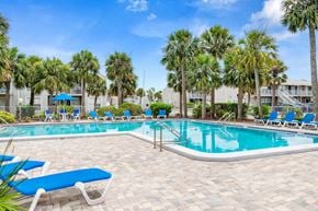 Daytona Beach apartment for rent - 12th and beach swimming pool and sundeck with lounge chairs