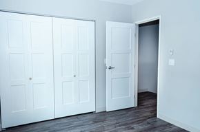 Plymouth apartment for rent - A room with a white door and a white wall.