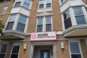 Indianapolis apartment for rent - A brick building with a pink sign that says Block of Hope Barton Center.