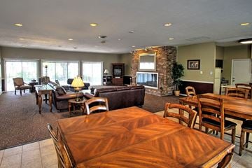 Elkhart apartment for rent - a living room and dining room with a table and chairs