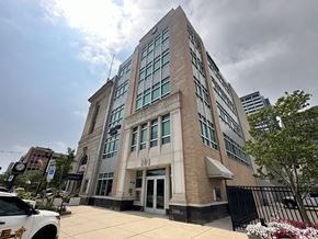 South Bend condo for rent - a building with a clock on the side of it
