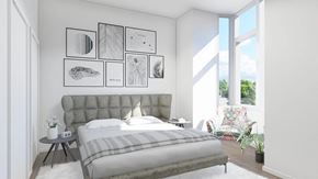Goshen apartment for rent - a bedroom with a bed and a chair in front of a window