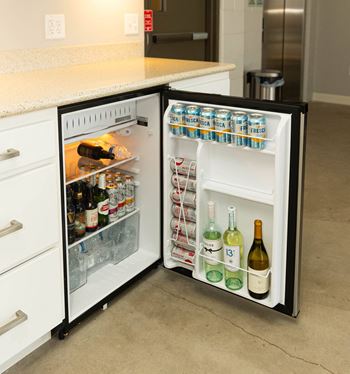 Community kitchen with stocked drinks