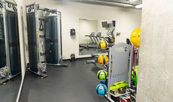 24-Hour fitness center with free weights