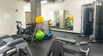 24-Hour fitness center with free weights